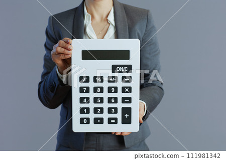 Closeup on woman worker against gray background 111981342
