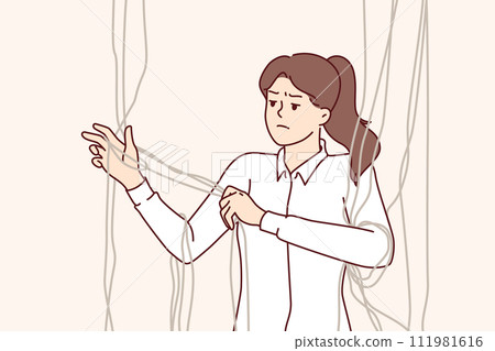 Dissatisfied woman unravels threads, trying to get rid of constraining mental factors Dissatisfied woman unravels threads, trying to get rid of constraining mental factors 111981616
