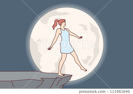 Woman experiences nightmare at night, imagining falling off cliff during full moon 111981640