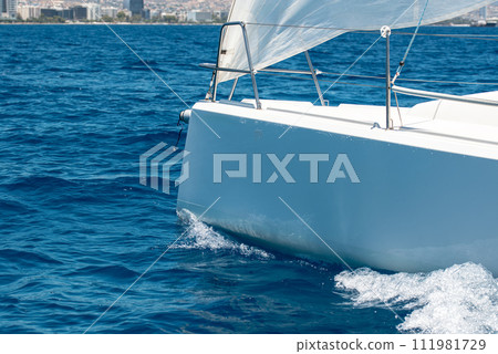 Close-up of a bow of a sporting yacht Close-up of a bow of a sporting yacht 111981729