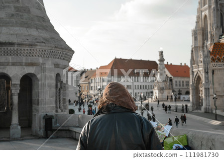 An old painter looking at Fisherman's Bastion. Budapest, Hungary An old painter looking at Fisherman's Bastion. Budapest, Hungary 111981730