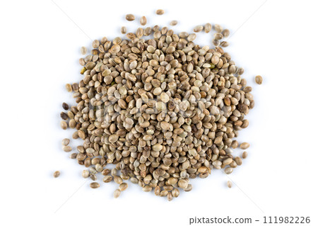 Cannabis hemp seeds pile close up macro shot isolated Cannabis hemp seeds pile close up macro shot isolated 111982226