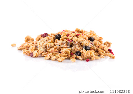 Muesli oat cereals close up background with dry fruits 111982258