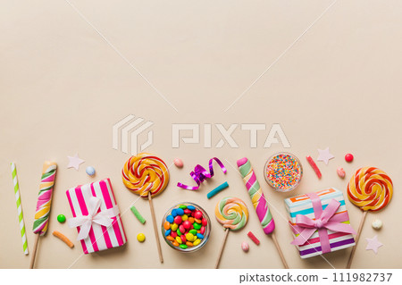 Collection of birthday party objects with gift box. Valentines day gift box. Top view flat lay with copy space 111982737