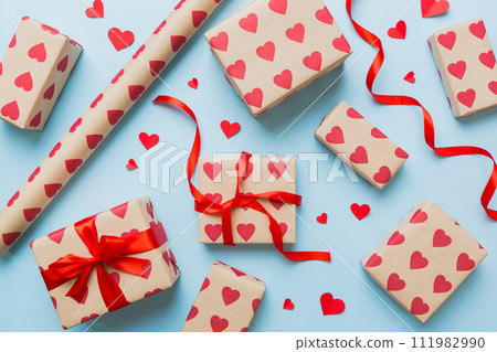 Creative gift box with decorations for the holiday, top view. Birthday and valentine present 111982990