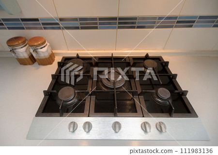 Gas panel built into the kitchen. Six-burner stove Gas panel built into the kitchen. Six-burner stove 111983136
