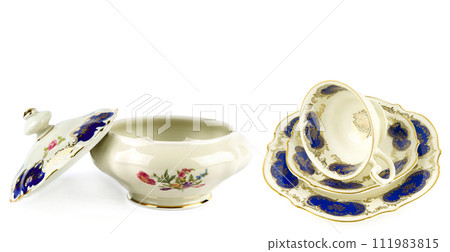 Porcelain vintage cup, saucer and candy bowl isolated on white. Free space for text. Collage. Wide photo. 111983815
