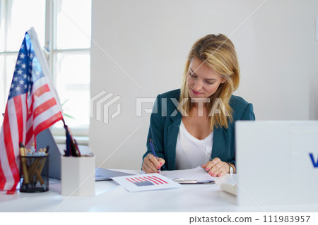 Member of electoral commission in polling place on election day, usa elections. Member of electoral commission in polling place on election day, usa elections. 111983957