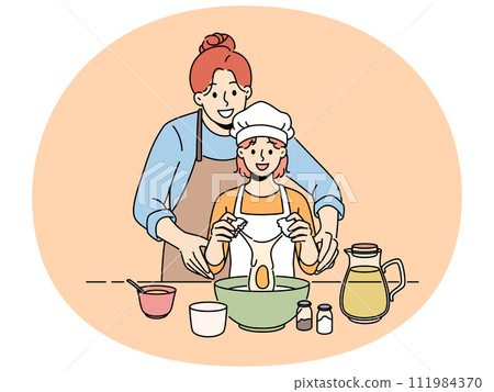 Smiling mother cook together with small daughter 111984370