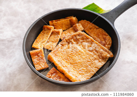 Fried stew made in a skillet 111984860