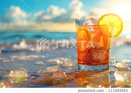 Cold drink with ice and a slice of lemon on the beach on a hot summer day. Ai generative 111984883