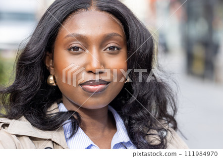 Close-Up of a Confident African Woman in the City Close-Up of a Confident African Woman in the City 111984970