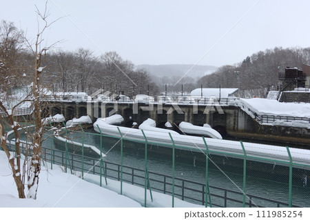 Konbu power plant intake weir in winter Konbu power plant intake weir in winter 111985254