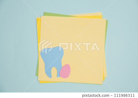 Happy Easter Dental Clinic Greeting Card, Text Space, Teeth and Egg Top View Happy Easter Dental Clinic Greeting Card, Text Space, Teeth and Egg Top View 111986311