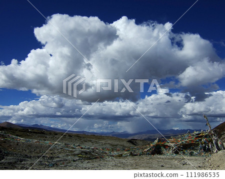 Clouds and blue sky in eastern Tibet, between Zogon and Pashu 111986535