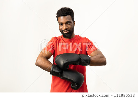 Confident African American Man with Boxing Gloves Isolated on White 111986538