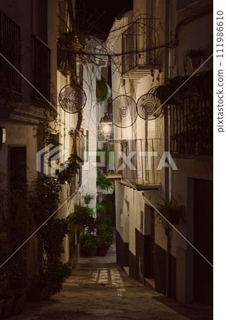 Calle Adentro at night. The most beautiful and famous street in the city of Quesada in the province of Jaen. 111986610