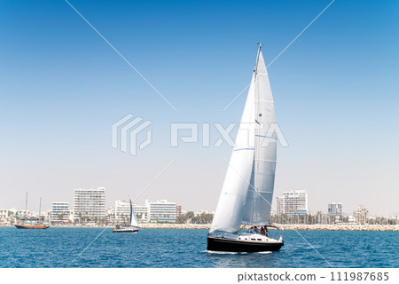 Yacht sailing at Larnaca bay. Cyprus 111987685
