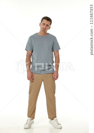 offended frustrated young man on white background. sadness 111987855