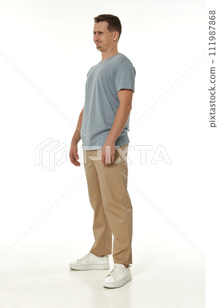 offended frustrated young man on white background. sadness 111987868