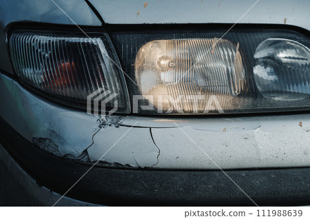 old car after an accident with damaged crumpled bumper close-up old car after an accident with damaged crumpled bumper close-up 111988639