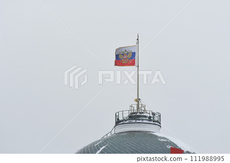 view of the Russian flag at the House of Soviets on Red Square in Moscow 111988995