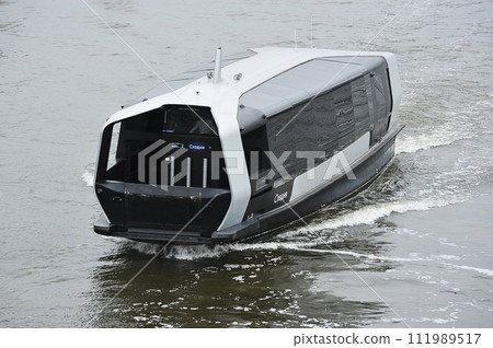 an electric ship sails along the Moscow river in Moscow 111989517