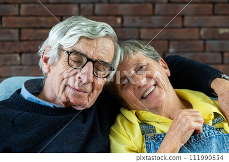 Content Elderly Pair Smiling with Eyes Closed Content Elderly Pair Smiling with Eyes Closed 111990854