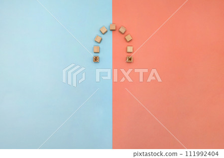 U-shaped magnet motif divided from the center into a light blue and pink background U-shaped magnet motif divided from the center into a light blue and pink background 111992404
