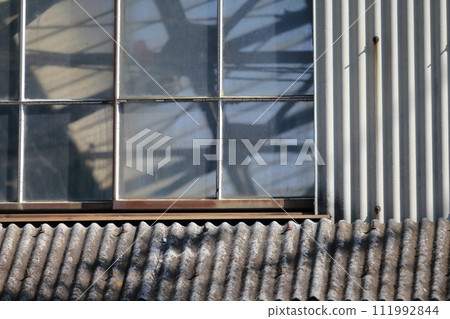 Factory exterior (corrugated slate exterior wall) Factory exterior (corrugated slate exterior wall) 111992844