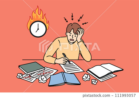 Excited man student is writing thesis and panicking because of deadline, sitting near burning clock 111993057
