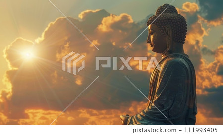 Golden Buddha statue in the clouds on the left. Minimalistic sky background with sun rays 111993405