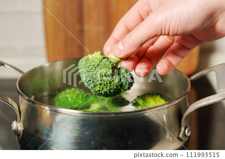 Cooking broccoli, proper, healthy nutrition. Selective focus 111993515