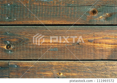 Wood texture, close-up wooden board, striped wood, old table 111993572
