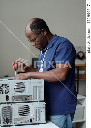 Professional mature male technician Professional mature male technician 111994247