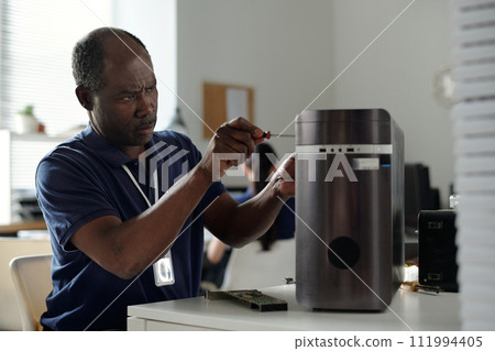 Man working in repair service office Man working in repair service office 111994405
