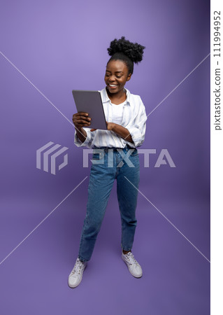 Smiling cute dark-skinned woman generating new ideas Smiling cute dark-skinned woman generating new ideas 111994952