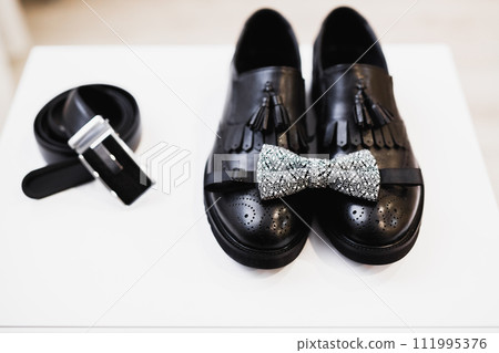 Men's accessories with luxury shoes. Top view Men's accessories with luxury shoes. Top view 111995376