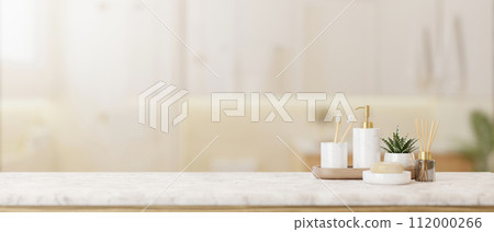 Toiletries and empty space on a white marble tabletop in a beautiful Scandinavian bathroom. Toiletries and empty space on a white marble tabletop in a beautiful Scandinavian bathroom. 112000266