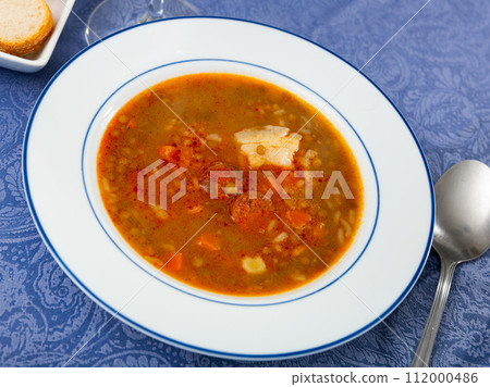 Potaje de lentejas, thick hearty lentil stew Potaje de lentejas, thick hearty lentil stew 112000486