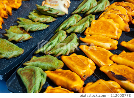 Empanada - popular dish on the Iberian Peninsula and in Latin America 112000778
