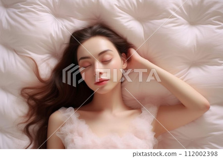 beautiful woman on the bed 112002398