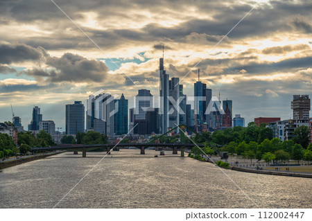 Frankfurt Germany, sunset city skyline at Main River and business skyscraper Frankfurt Germany, sunset city skyline at Main River and business skyscraper 112002447