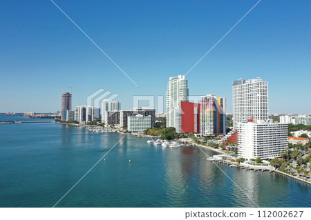 Aerial of waterfront residential buildings in Brickell area of Miami, Florida. Aerial of waterfront residential buildings in Brickell area of Miami, Florida. 112002627
