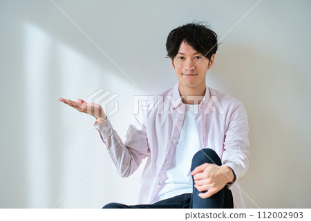 A man posing as a guide A man posing as a guide 112002903