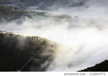 Top view Landscape of Morning Mist with Mountain Layer at north of Thailand. mountain ridge and clouds in rural jungle bush forest 112003772