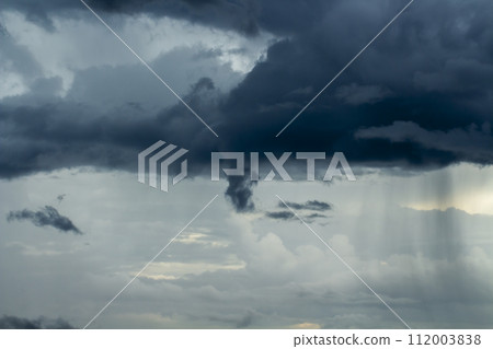Storm clouds with the rain. Nature Environment Dark huge cloud sky black stormy cloud Storm clouds with the rain. Nature Environment Dark huge cloud sky black stormy cloud 112003838
