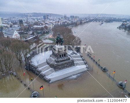 Flooding high water Koblenz Germany historic monument German Corner winter where rivers rhine and mosele flow together 112004477