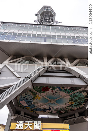 Tsutenkaku tower famous landmark in the Shinsekai district of Osaka, Japan 112004490
