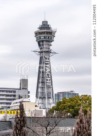 Tsutenkaku tower famous landmark in the Shinsekai district of Osaka, Japan 112004495